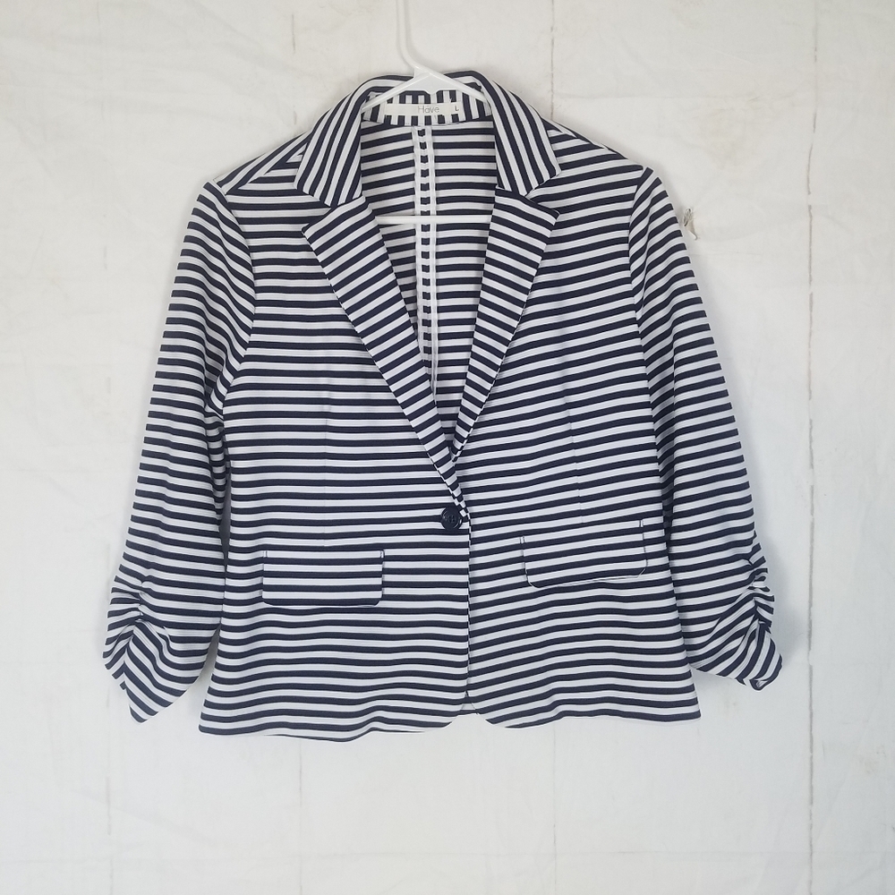 Have black and white striped Blazer